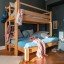 De Breuyn Twin-over-full Etagenbett aus massiver Buche, oben mit 90, unten mit 140 cm Liegeflächenbreite.