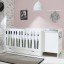 Babybett Moon mit angeschraubter Wickelkommode und Bettkasten